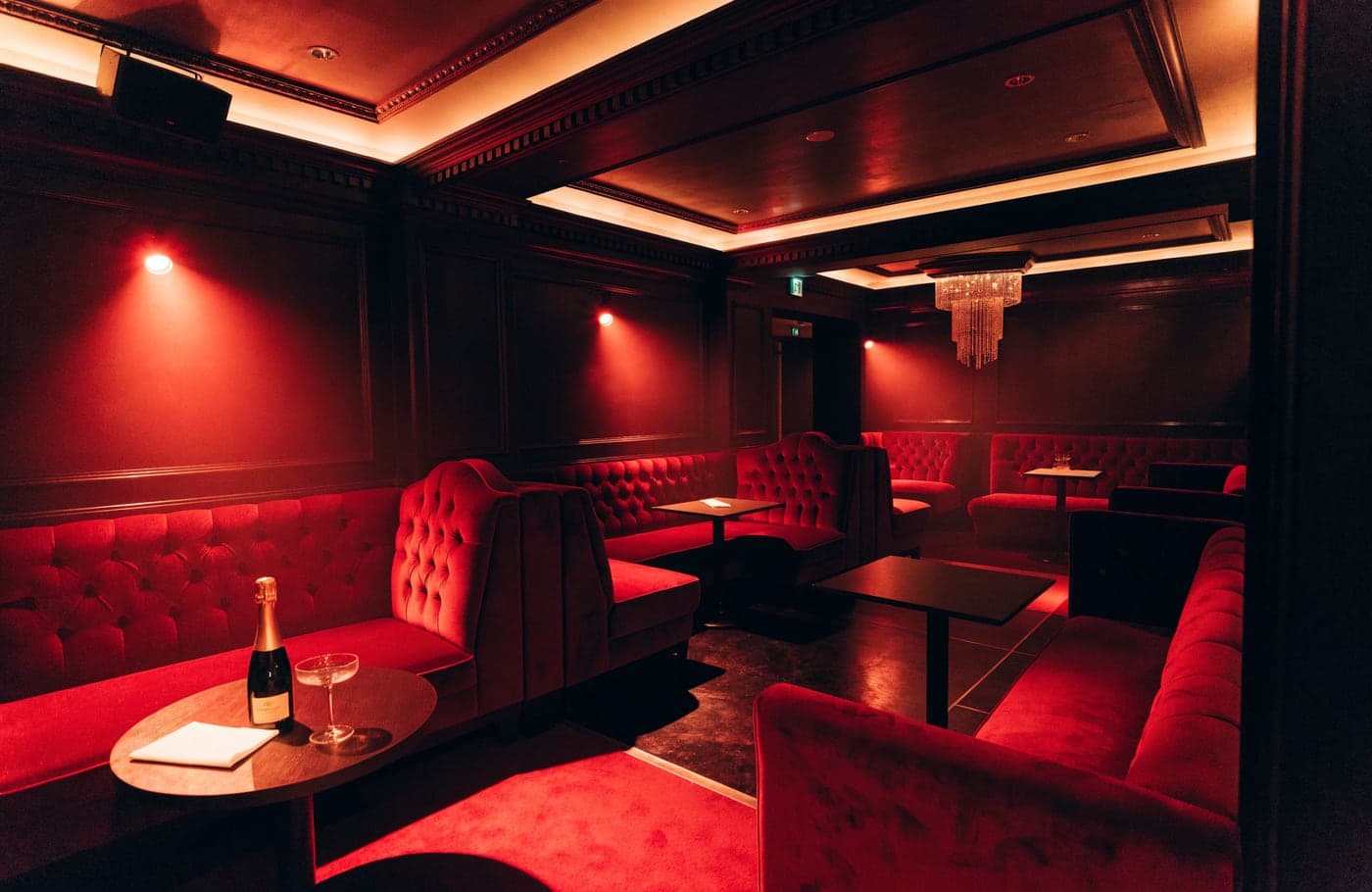 Rumour at 1 Dover Street, the red velvet booths in the main room